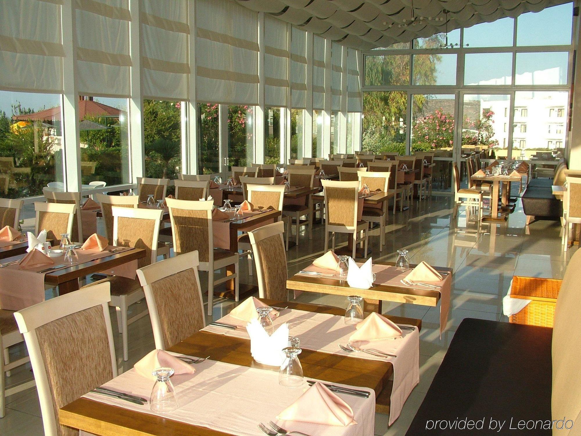 Babaylon Hotel Кешме Ресторан фото